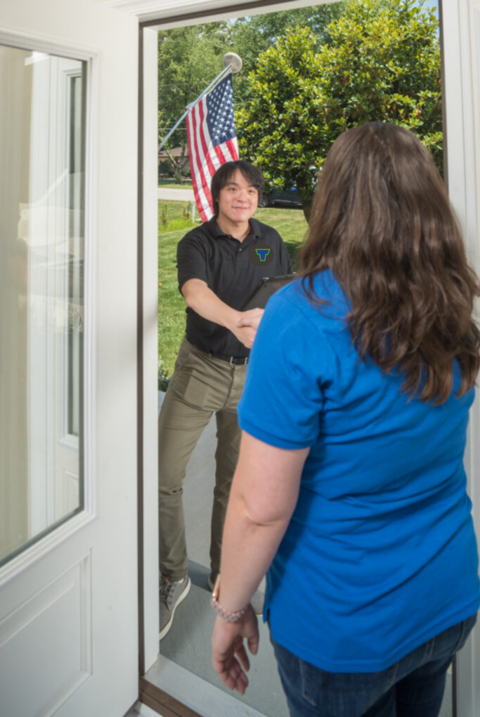 Member opening their door to excellence and a Trademasters technician