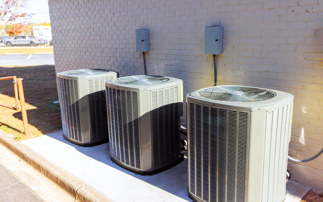 An outdoor air conditioning units has been installed on exterior facade of new a house
