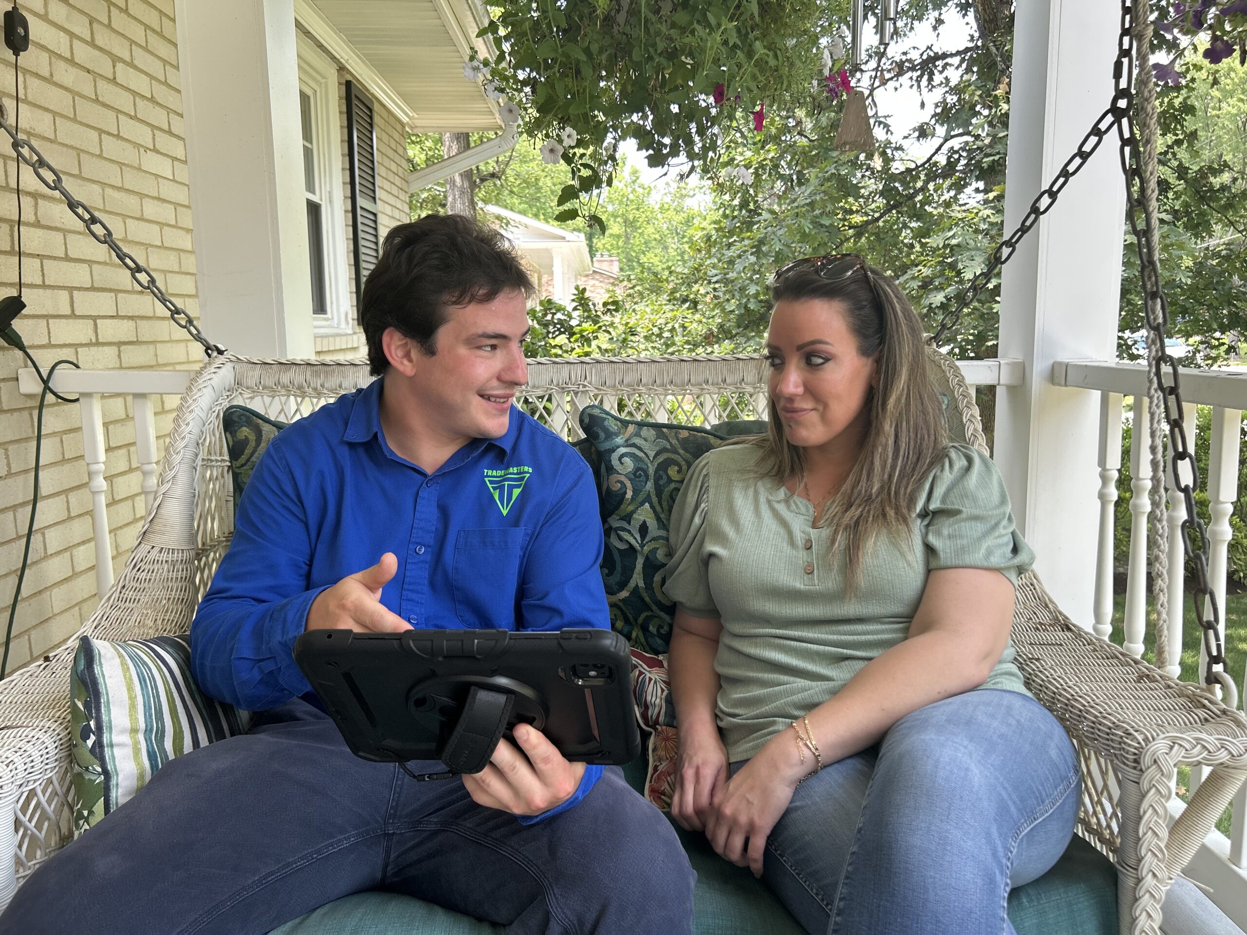 Trademasters team member sharing the results of a TM Home Wellness Review with a homeowner.